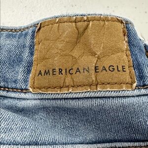American Eagle Light Blue Denim with Tan Patch